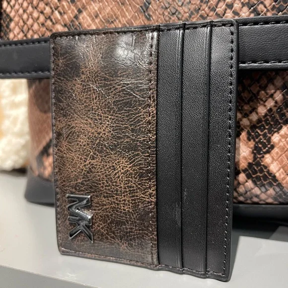 MICHAEL KORS Cyrus Burnished Tall Card Case
Chocolate Brown 
NWT - Picture 15 of 16